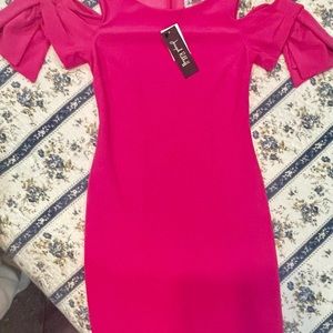 Beautiful pink sexy, but classy dress- below knee. Never worn.